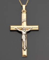 A stunning crucifix enhanced by lustrous two-tone 14k gold. Approximate length: 1-1/2 inches. Chain not included.