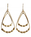 Cutting edge style by Kenneth Cole New York. Goldtone drop earrings in mixed metal. Approximate drop: 1-3/4 inches.