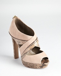 In nude suede and genuine watersnake, Tory Burch's Waverly sandals lend a luxe look atop a tall five-inch heel.