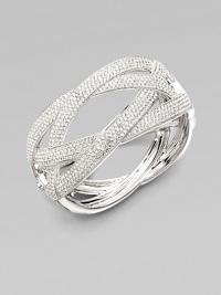 EXCLUSIVELY AT SAKS. A wide pattern of elegantly interwoven strands of pavé crystal creates a look of endless sparkle.Crystal Rhodium plated Diameter, about 2¼ Hinged with push-lock clasp Imported