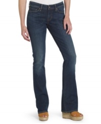 Turn heads in these curve-hugging jeans from Levi's. A flattering bootcut leg and slightly faded wash gives them the look of vintage classics!