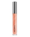 This classic, radiant formula combines sexy color and shine with a luminous finish.* Precision brush tip* Non-stick wear* Never dryingUsing the brush tipped applicator sweep gloss over the lips. For soft definition, line and blend your lips with Trishs Lip Liner before and after gloss application.