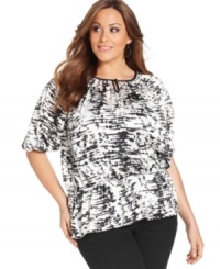 Awaken your neutral bottoms with NY Collection's elbow sleeve plus size peasant top!