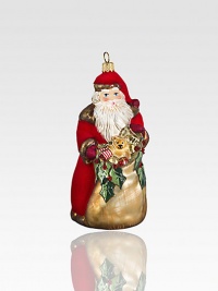 This elegantly robed vintage-style Santa of expertly mouth-blown, hand-painted glass shimmers with touches of gold and glitter.Glass9H X 4.5W X 4.5DImported