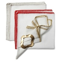 Delicate, metallic stitching adds sparkle to a classic linen napkin.