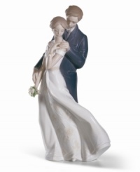 Celebrate your eternal love with this charming porcelain figurine from Lladro. The intricate detail and endearing sentiment make this piece a lovely gift for any special couple.