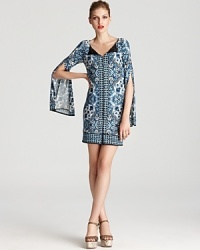 Split sleeves lend a bohemian look to Laundry by Shelli Segal's printed dress--an exposed zip front boasts dramatic flair.