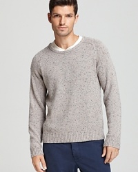 Add pep to your repertoire with this speckled crewneck sweater, a handsome layer when you're out shopping or watching a Hitchcock marathon at home.