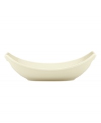 Feature modern elegance on your menu with this Classic Fjord oval serving dish. The piece serves up glossy khaki-colored stoneware with a fluid, sloping edge that prevents spills and keeps tables looking totally fresh. From Dansk's collection of serveware and serving dishes.