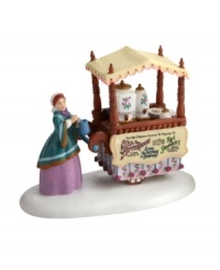 You're cordially invited to afternoon tea. Dressed in fine Victorian wares, this lovely tea monger from Department 56 serves fine cups from rose-patterned urns to match her cart, as well as cakes, sweets and the Earl of Sandwich's bread and butter morsels.