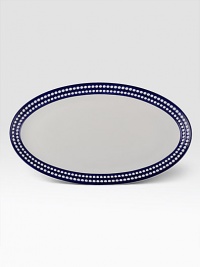 From the Perlee Bleu collection, inspired by the blue horizons and white domes of the Grecian Islands, this versatile platter is perfect for casual dining or entertaining.Hand-painted Limoges porcelain21 X 12Dishwasher safeMade in Portugal