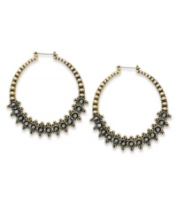 Black and gold creates an antique-inspired earring style, by Style&co. Jet glass stones change the mood on these timeless hoops. Crafted in antiqued gold tone mixed metal. Approximate diameter: 2 inches.