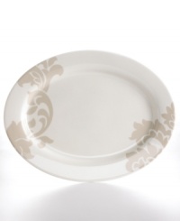 Bold design and uncompromising quality make the Lisbon oval platter easy to love. Embrace stenciled grey florals or mix and match with equally fresh Banded dinnerware, also by Martha Stewart Collection.