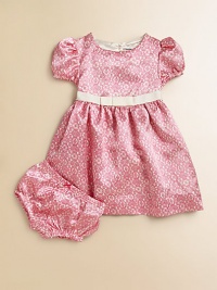 A pretty lace print on lustrous satin charmeuse makes the loveliest party dress for your little princess.Round necklineShort puffed sleevesBack button closeEmpire grosgrain ribbon waist with bowFull skirtFully lined in satinMatching bloomers with elasticized waist and leg openingsPolyesterMachine washImported Please note: Number of buttons may vary depending on size ordered. 