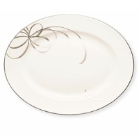 The new Belle Boulevard collection from Kate Spade reflects the classic elegance that is identifiably Kate Spade. The platinum banded, white-body, fine bone china pattern features a series of looping platinum bows that create a layered effect when the place settings are stacked.