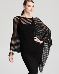 An irreverent cut and allover mesh lend a provocative finish to this Eileen Fisher poncho. Layer the style over sleek, black separates for the ultimate in urban edge.