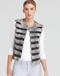 Intermingling stripes of luxe rabbit fur and smooth lambskin leather enrich this gorgeous DIANE von FURSTENBERG vest for the ultimate top layer luxe.