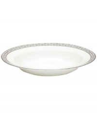 Sit down to a stylish table with the Hightown rim soup bowl by Martha Stewart Collection. Contemporary bone china dinnerware with a distinct platinum pattern puts modern sophistication at the top of your menu.