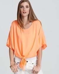 Hyper-bright and ultra-billowy, this Vintage Havana top boasts a tie at the hem for fresh summer style.