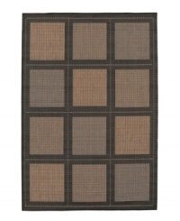 Like a patchwork quilt, 12 squares sit on the surface of this beautiful all-weather rug, each containing one of three distinctive textures. Suitable for use both indoors and out, this piece brings a touch of warmth to stone entryways, patio decks and all other outdoor gathering areas. Perfectly complimenting its natural surroundings, this rug is textured and gently colored with black and shades of cocoa. Pet friendly and resistant to all mold and mildew. One-year limited warranty.