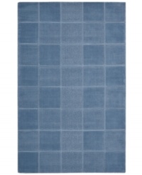 An a-tonal blocked design in lush blue creates a sophisticated, modern accent in the Westport area rug from Nourison. Hand-tufted in  India of pure wool for premium softness and durability.