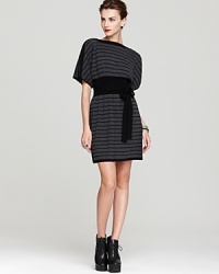 A zippered neckline gives unexpected edge to a Laundry by Shelli Segal sweater dress.