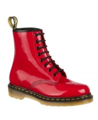 The Dr. Martens Women's 1460 8 Eye Boots shine in a high-gloss patent finish for a whole new generation of style.