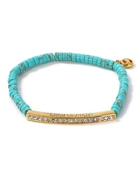 Work Southwestern flair into your accessory collection with MICHAEL Michael Kors' turquoise bracelet. Wear the the Santa Fe-inspired style day and night--it loves denim and and LBDs.