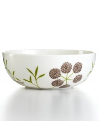 A thoroughly modern beauty, the Garden Glimmer vegetable bowl from Martha Stewart Collection balances smart and striking design with a stylized botanical pattern in ultra-sturdy porcelain. (Clearance)