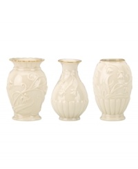 Lenox combines ivory porcelain sculpted with graceful blooms, elegant fluting and touches of gold in this trio of classically styled Floral Melody posy vases.