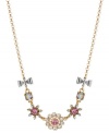 Fashion-forward with the florals. Betsey John's frontal necklace, crafted from gold-tone mixed metal, dazzles with colorful glass crystals and silver-tone bows for a whimsical touch. Approximate length: 16 inches + 3-inch extender. Approximate drop: 5/8 inch.