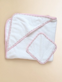 The perfect set for baby's first bath, in snuggly cotton terry edged in floral vine trim.Includes towel and washclothMachine washCottonImported