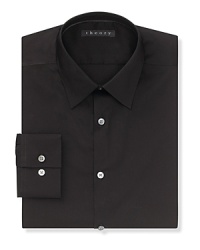 Solid dress shirt with spread collar, two button mitered cuffs. Contemporary fit through the body.