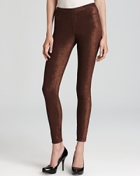 Put these pants on night watch: HUE legging-jeans sparkle in foil-print pewter and copper.