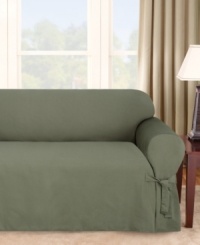 Featuring a narrow pinstripe weave in solid hues, Sure Fit's Logan sofa T-cushion slipcover gives your furniture a bold new look. Subtle textured detail and decorative ties add to this slipcover's classic appeal. One piece.