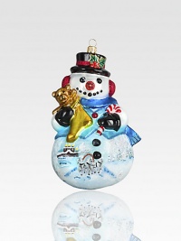 A top-hatted snowman adorned with charming Russian scenes has dazzling touches of glitter and gold atop his mouth-blown, hand-painted form.Glass6.25H X 3.5W X 3.5DImported