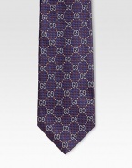 Signature GG pattern woven in superior Italian silk.About 3.1 wideSilkDry cleanMade in Italy