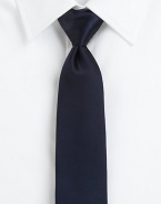 Modern elegance expertly crafted in smooth Italian silk.About 3 wideSilkDry cleanMade in Italy