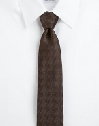 Expertly crafted in Italian silk and finished in a handsome houndstooth pattern.About 3 wideSilkDry cleanMade in Italy