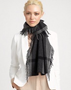 A large check pattern and fringed edges embellish this ultra-soft, woven wool and cashmere wrap.Wool/Cashmere18 X 61Dry cleanImported