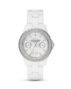 A crystal-encrusted bezel sets this chic white watch to sparkle. From MICHAEL Michael Kors.