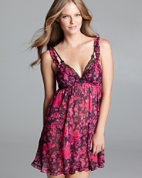 A flirty, floral print adorns this Betsey Johnson babydoll with lace detailing at the cups.