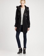 Versatile parka with a fox fur collar and inner removable rabbit fur vest for added warmth.