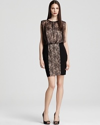 Accented with lace, this Aidan Mattox dress is a romantic choice for the party season.