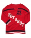 He'll want to score the winning shot when wearing his hockey-inspired jersey from Carter's.