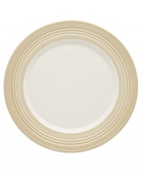 This charming porcelain accent plate features a four-ringed border. Mix and match with other Tin Can Alley Khaki pieces for a subtly varied table setting.