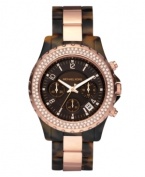 Stake your claim on distinctive style with this unique watch by Michael Kors.