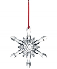 Baccarat captures the intricacies of a snowflake in this stunning crystal ornament, a timeless gift to be cherished every holiday season.