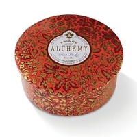 Indulge in the luxurious fragrance of ginger and rosewood with this fine candle, housed in a metallic tin that's alluringly adorned with a decorative print.