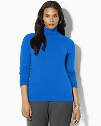 Luxurious cashmere yarns infuse the perennial turtleneck with a note of classic elegance.